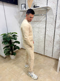 Conjunto deportivo beige