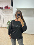 Blusa metalizada negra